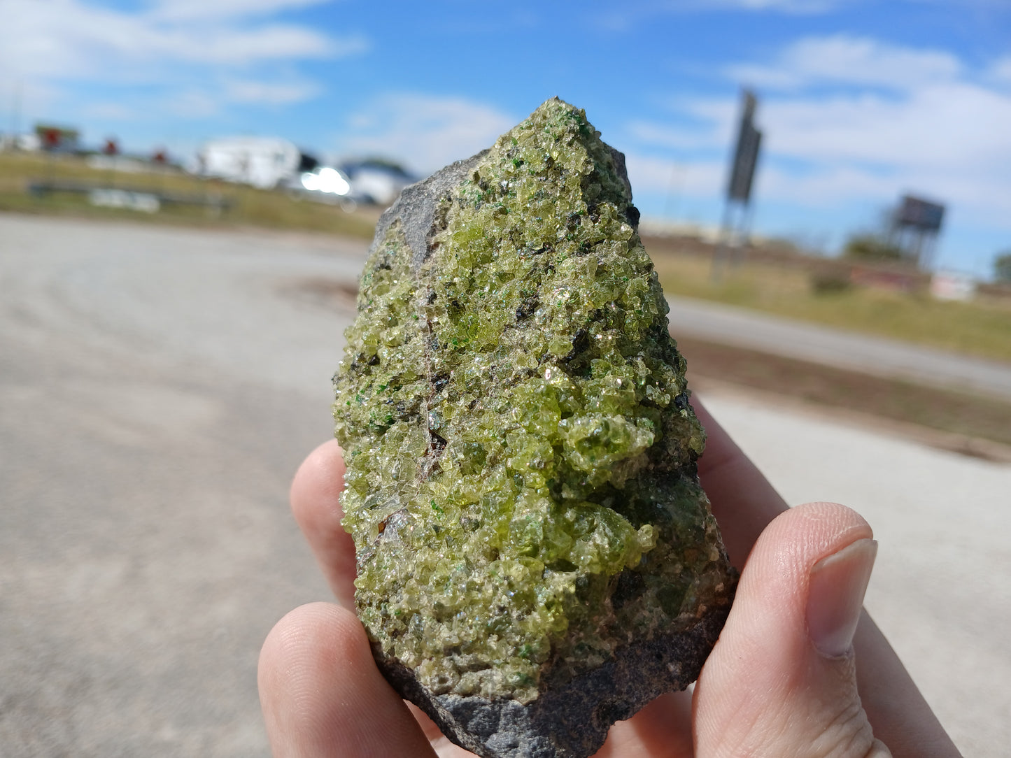 Bright Green Peridot on Basalt