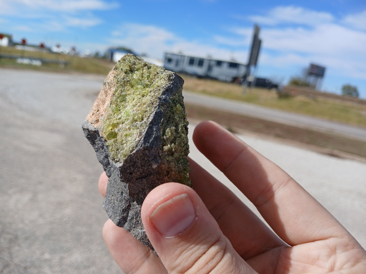 Bright Green Peridot on Basalt