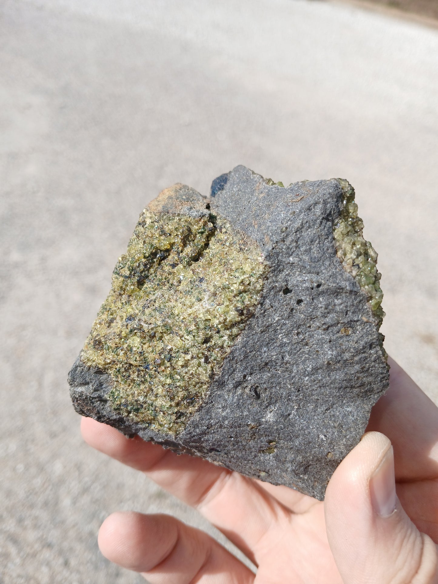 Bright Green Peridot on Basalt