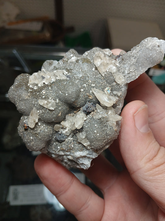 Calcite, Iridescent Marcasite, Sphalerite, and Barite on Quartz